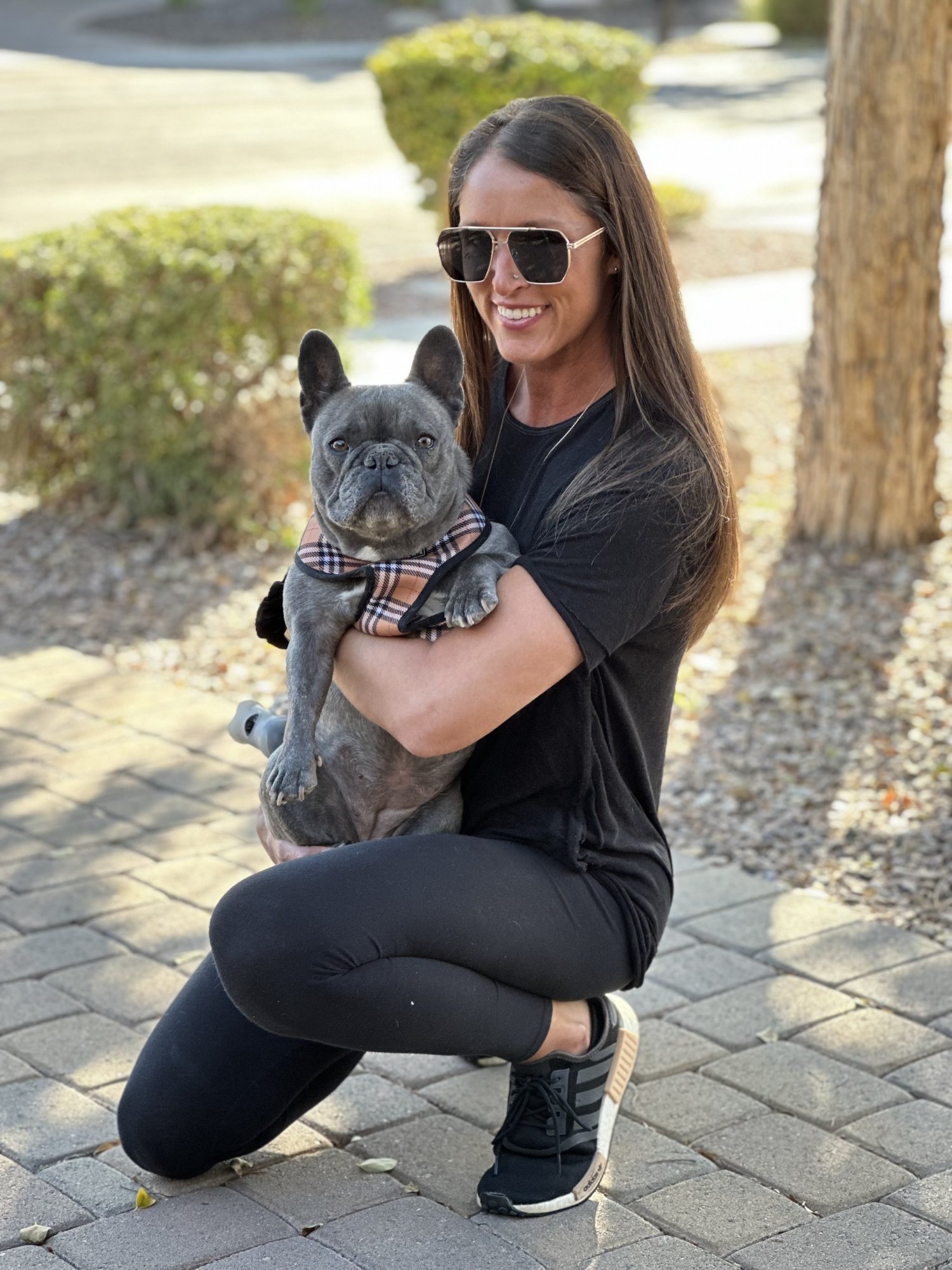 Jen holding Tula the French Bulldog outside in Queen Creek Arizona - Desert Paws AZ